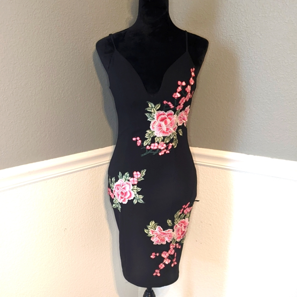 Entry black dress with rose detail size M